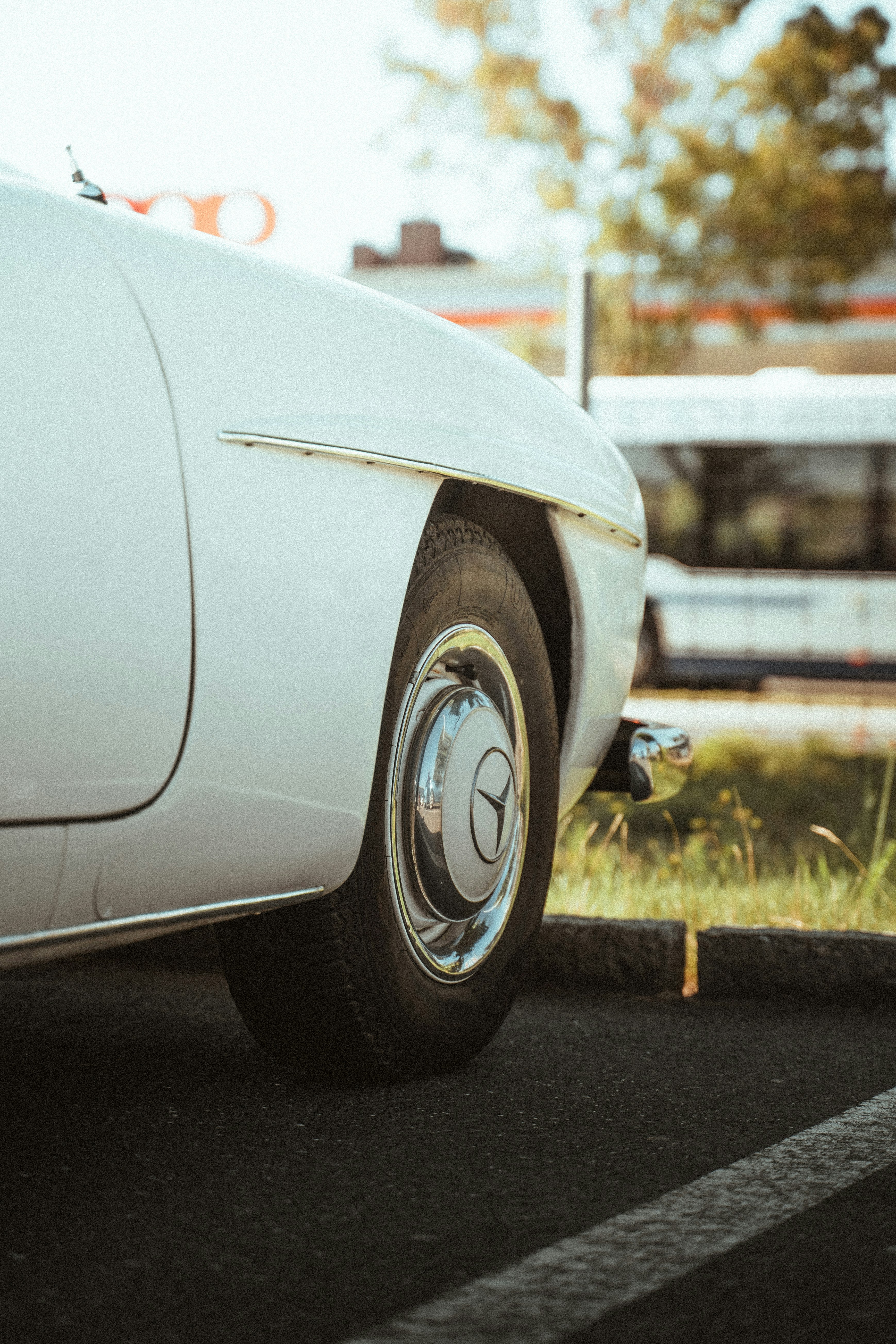 white porsche 911 on road during daytime